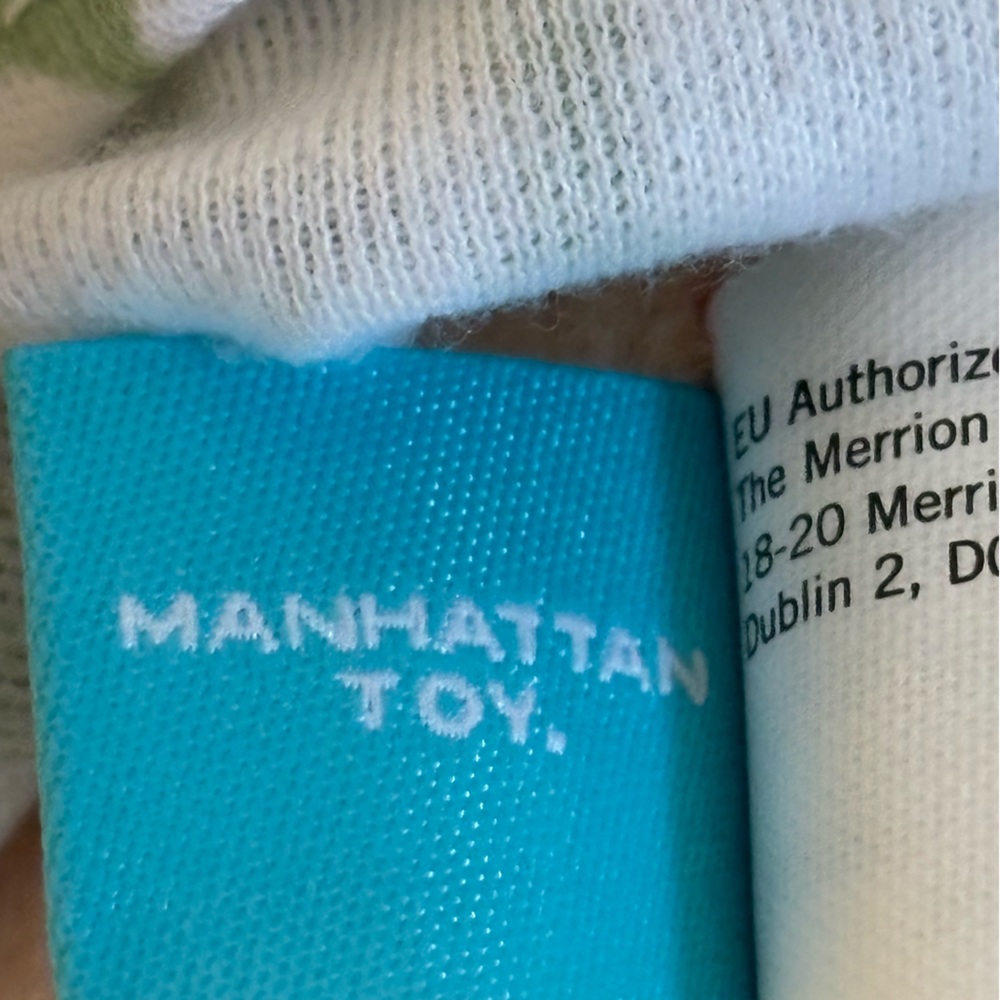 Manhattan Toy Plush Baby Doll in Green Heart Dress - Soft Toy for Kids - Picture 4 of 4